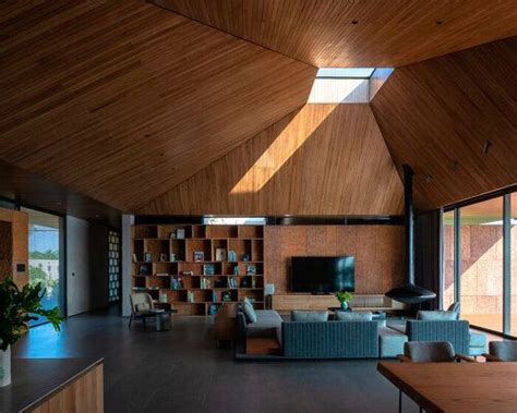 wooden pyramid skylight illuminates suoi hai villa's interior in ...