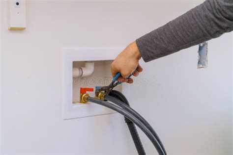 Installation of a Laundry Outlet Boxes in a New House for Connection of Water To the Washing ...