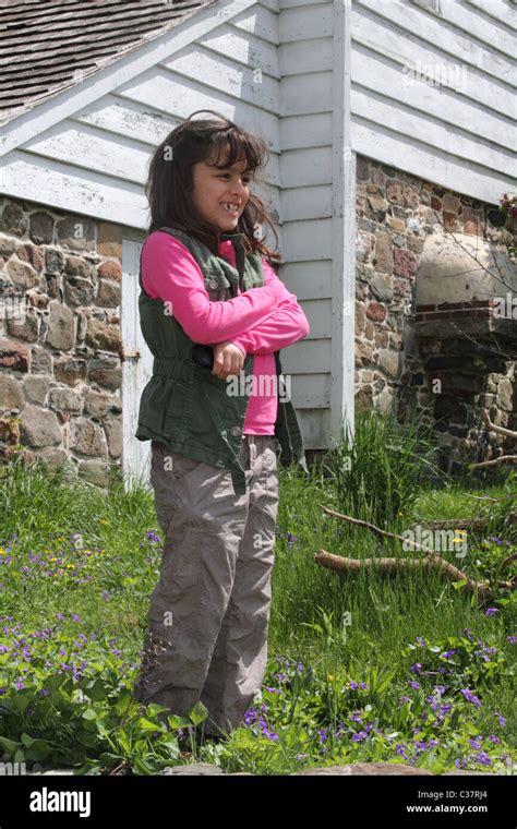 Young girl outdoors smiling Stock Photo - Alamy