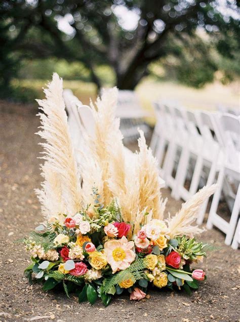 Wedding Ceremony Aisle Decoration with Pampas Grass | Flower arrangements, Grass wedding ...