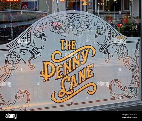 The Penny Lane wine bar, etched pub window, 116 Penny Ln, Liverpool L18 1DQ Stock Photo - Alamy