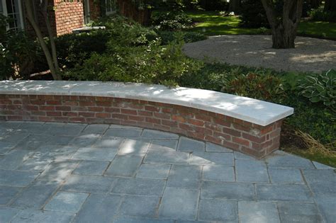 natural stone patio with limestone cap and brick wall Brick Porch ...