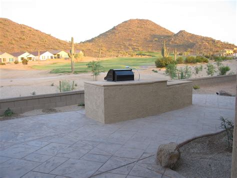 Arizona desert landscape design with riverbeds, rock, plants