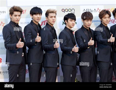 12 February 2014 - Seoul, South Korea : South Korean K-Pop boys group EXO M, attend a photo call ...