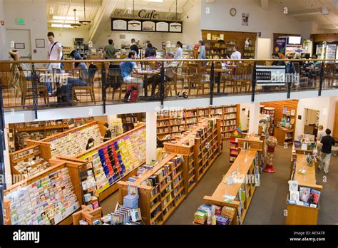 Inside Stanford University Bookstore with books and cards on lower level and cafe on second ...