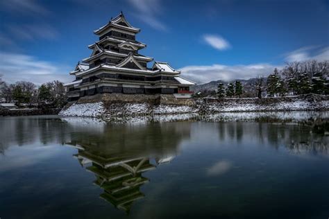 Matsumoto castle in winter stock image. Image of postcard - 137652595