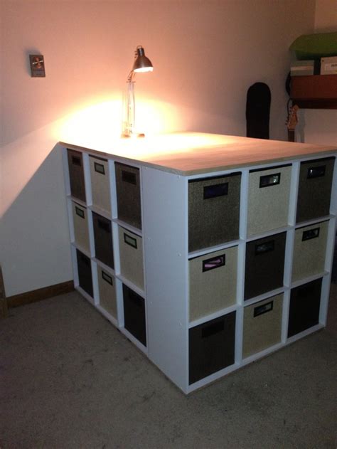 My new craft storage table! 3 9 cube cubbies and a glued panel top ...