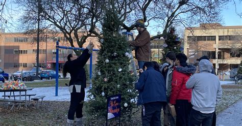 Students decorate Christmas trees for Milwaukee Holiday Lights Festival