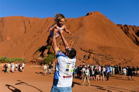 The final ascent: Tourists react as ancient Uluru closes to climbers for good | 7NEWS.com.au