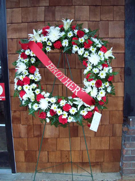 Tribute to brother wreath by Cleveland Florist | Holiday decor, Christmas wreaths, Wreaths