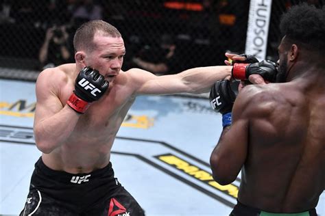 Petr Yan clarifies why he threw an illegal knee on Aljamain Sterling at ...