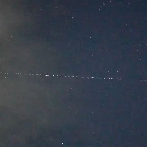 A train of SpaceX Starlink satellites seen travelling high over Japan : r/space