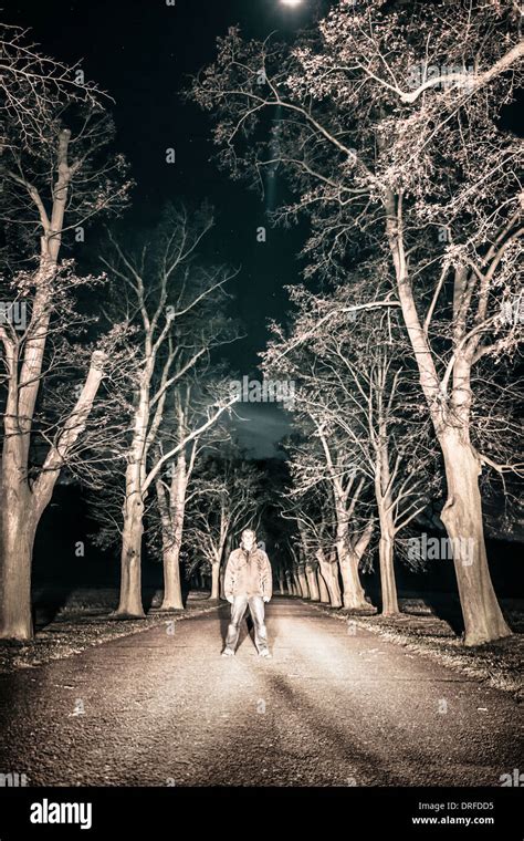 Scary horror person standing in night landscape Stock Photo: 66108033 ...