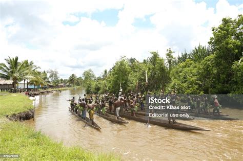 Welcome Ceremony On The River Of Asmat Tribe Stock Photo - Download Image Now - Asmat Tribe ...