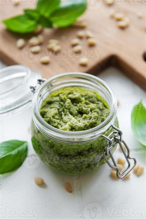 Green basil pesto 13679232 Stock Photo at Vecteezy