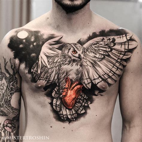 Owl Holding Heart Chest Tattoo | Best tattoo design ideas