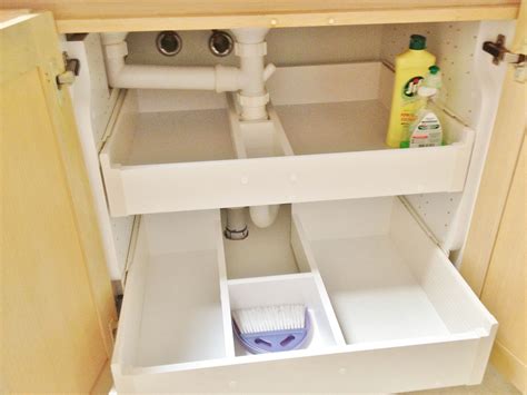 Pull-out drawers in double undersink cabinet. #inadrawer #smartstorage | Undersink storage, Sink ...