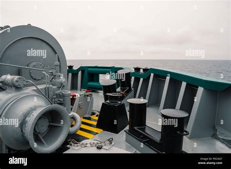 mooring equipment of ship. Mooring bollards, capstan and winch Stock Photo - Alamy