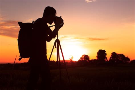 Premium Photo | Silhouette of photography with a sunset setting