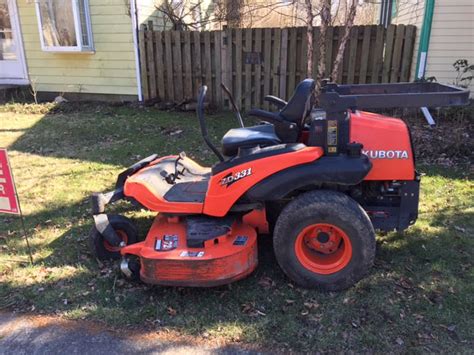 KUBOTA ZD331 Zero Turn Mower and Antique Display Case