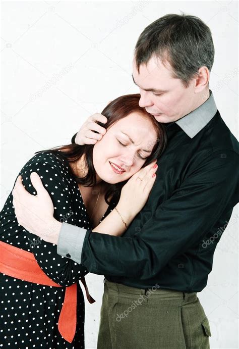 Man comforting his crying woman — Stock Photo © DarkBird #18852073