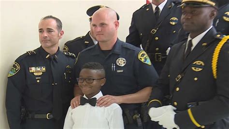 Boynton Beach police department surprises fallen officer’s son at graduation