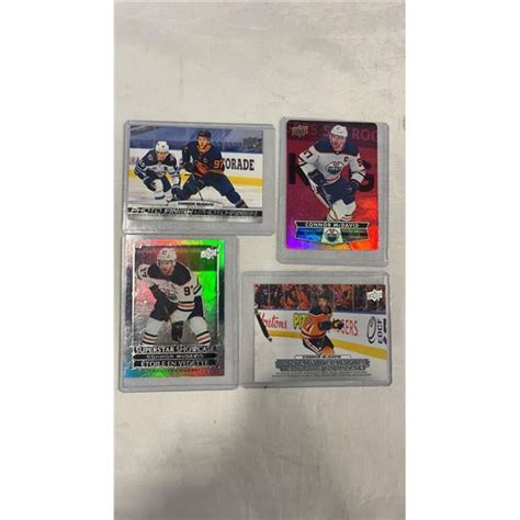 4 COLLECTIBLE CONNOR MCDAVID HOCKEY CARDS