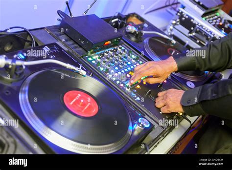 The DJ, Disc Jockey, plays vinyl records and music for a party Stock ...