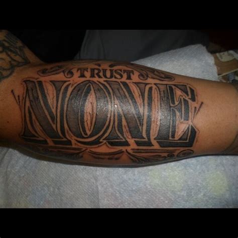 Trust None! | Money tattoo, Arm tattoos for guys, Loyalty tattoo