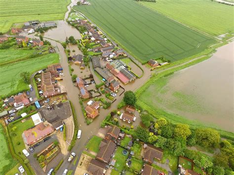 Flooded out - images reveal aftermath of terrible weather in Wainfleet as crews continue the ...