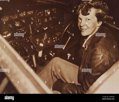 Amelia Earhart in the cockpit of her Lockheed Model 10-E Electra ...