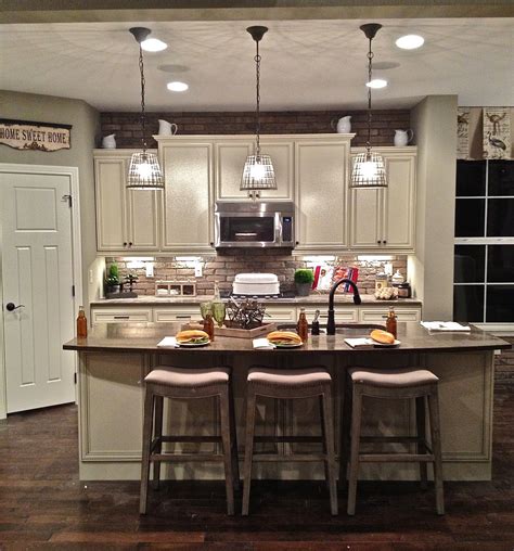 Interior,Triple Cage Pendant Island Lighting Over Large Kitchen Island And Wooden Stools As Well ...