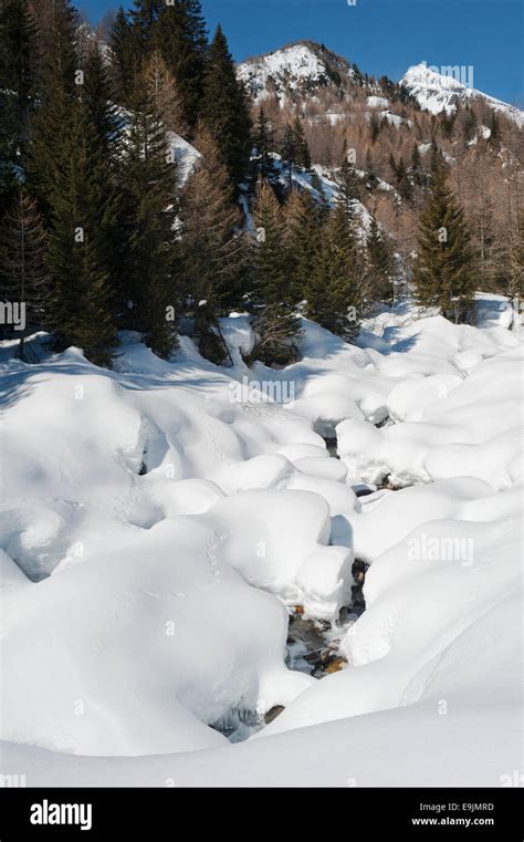 mountain landscape with stream Stock Photo - Alamy