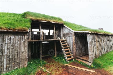 Traditional Viking village. Wooden houses near the mountain first settlements in Iceland ...