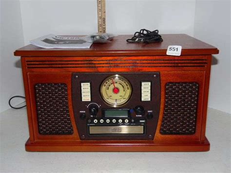 Victrola 8-in-1 Nostalgic Entertainment Center: 17 3/4" x 13 1/4" x 10 1/4" - Dunker Auction