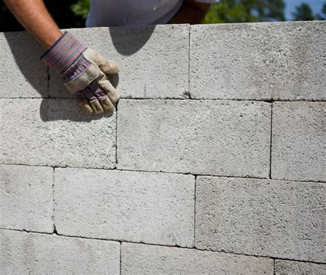 Build a Mortarless Block Wall | Cinder block walls, Concrete block ...