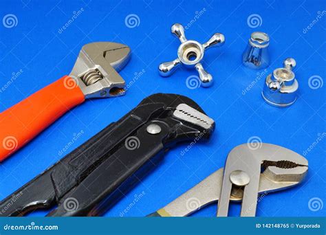 Plumbing Work Tools on a Blue Background Stock Image - Image of background, building: 142148765