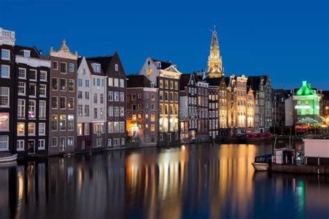 Damrak Canal at Night, Amsterdam, Netherlands Editorial Stock Image - Image of reflection ...