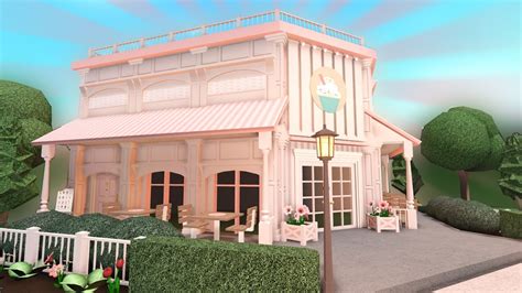 building a pink cafe in bloxburg - YouTube