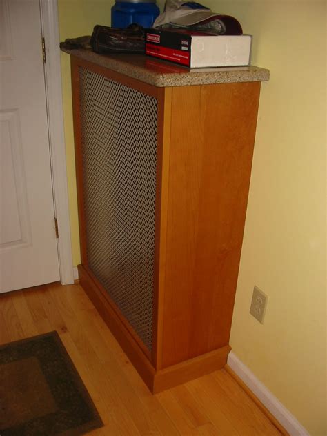 Steam radiator cover with a stone top. Great for drying gloves or a ...