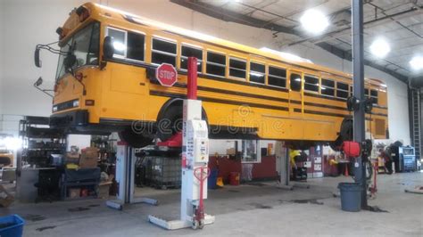 School Bus in the Repair Shop Editorial Stock Photo - Image of wheel ...