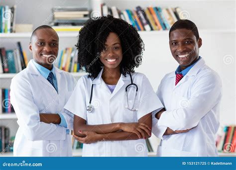 Practitioner Doctor Monitoring Sick Man Writing Disease Treatment On Clipboard Stock Image ...