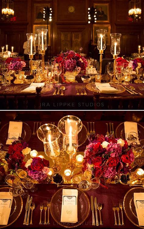 the table is set with flowers and candles