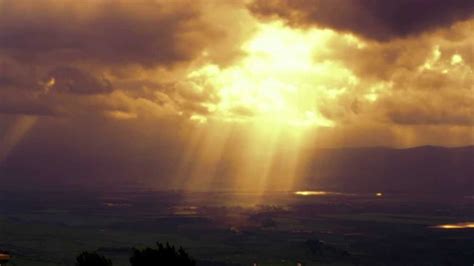 Golan Heights, Israel - Sun rays illuminating through clouds 4K stock footage - YouTube