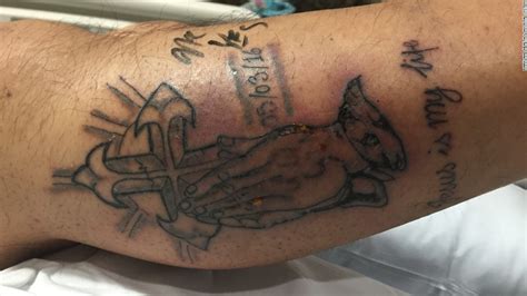 Man dies after swimming with new tattoo - CNN