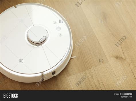 White Robot Vacuum Image & Photo (Free Trial) | Bigstock