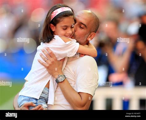 Manchester City manager Josep Guardiola celebrates with his daughter ...