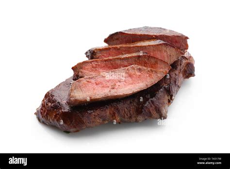 Tasty cooked meat on white background Stock Photo - Alamy