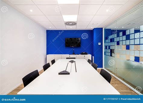 Empty Meeting Room for Conversation with Table, Chairs, Television in ...