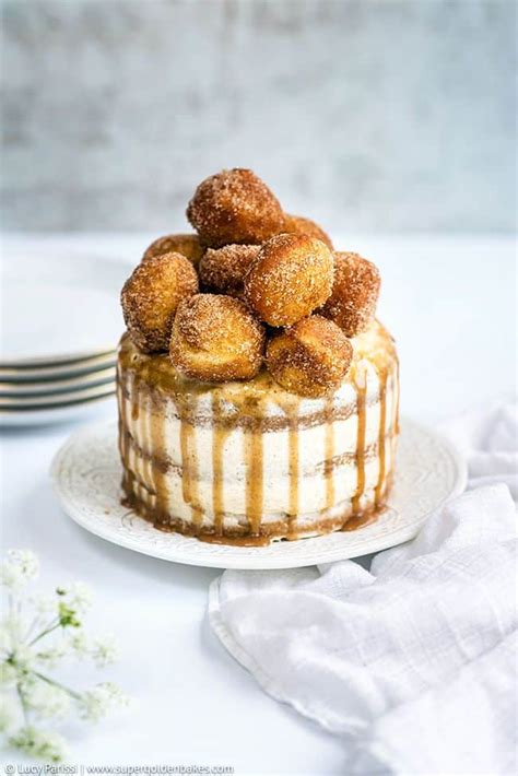 Sugar and spice layer cake decorated with mini doughnuts